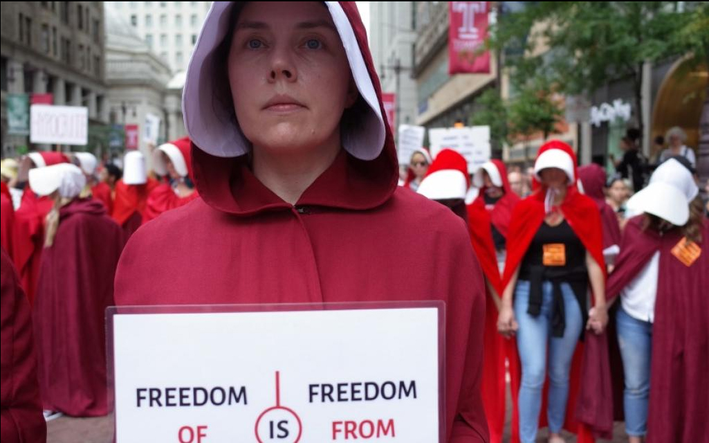 Dozens of women dressed as handmaids are set to greet Vice President Mike Pence in New York, just as they did in Philly last week. (Kait Moore)